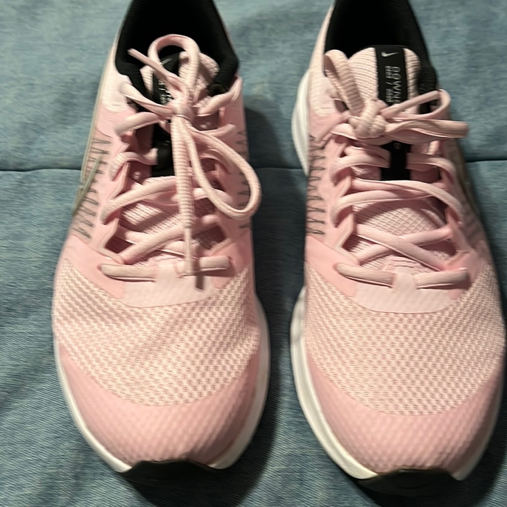 Nike pink shoes youth size 6. Fits like a women’s 8